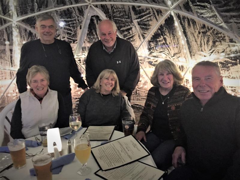 Down East Yacht Club members, front, from left: Jane Mulholland, Susan Pope, Jean McKay and Bob McKay; back row, from left: Dana Mulholland and Brent Pope, were loving the igloo dining experience at Tugboat Dec. 2. LISA KRISTOFF/Boothbay Register