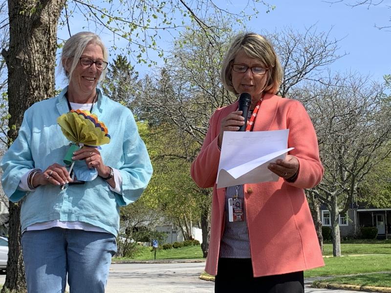 Lincoln County teacher of the year Trae Stover listens as Principal Kathleen Pastore reads her letter nominating Stover. SUSAN JOHNS/Wiscasset Newspaper