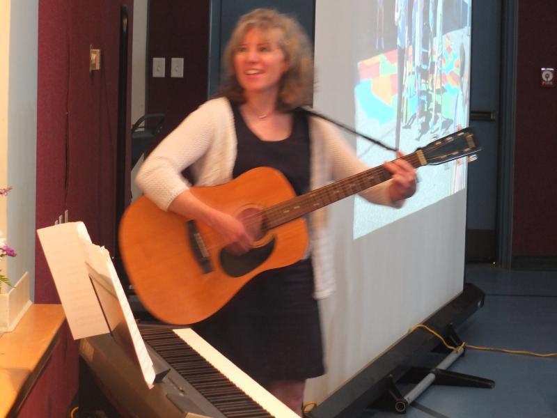 Music teacher Jennifer McIvor leads a group sing-a-long of the Edgecomb Eddy song. BILL PEARSON/Boothbay Register