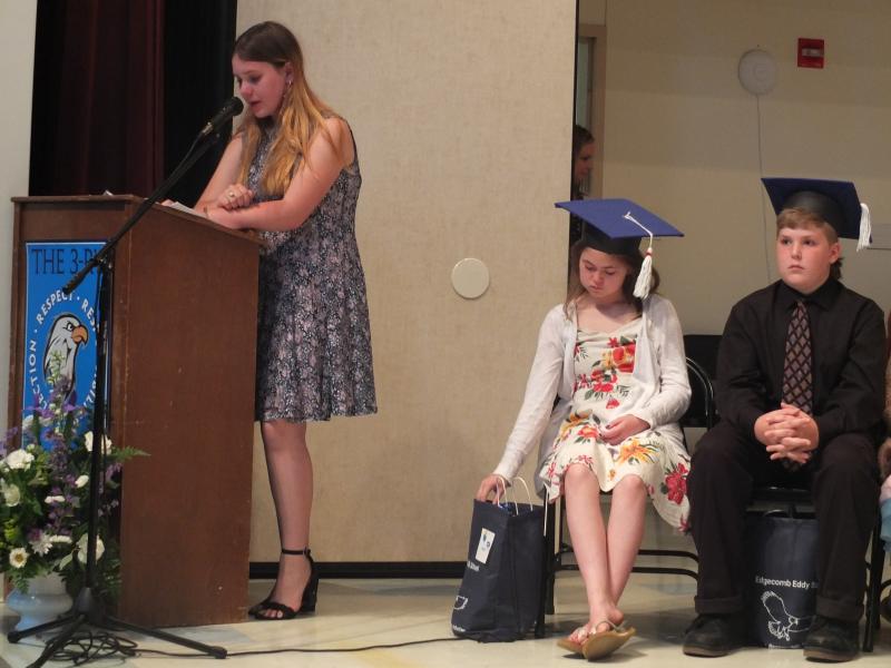 Sixth grader Eliza Chase gives a heartfelt good-bye to Edgecomb Eddy. BILL PEARSON/Boothbay Register