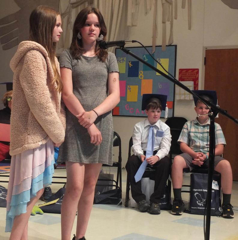 Graduates Skyler Spofford, right, and Gabrielle Cassidy sing “High Hopes.” BILL PEARSON/Boothbay Register