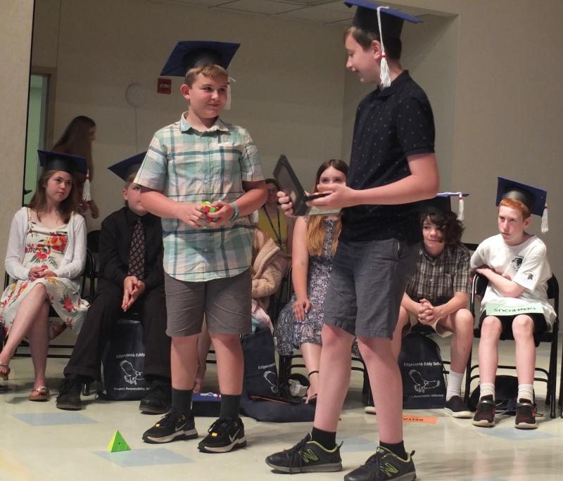 Jackson Zehm, left, and Simon Hubbard display their Rubik’s Cube skills. BILL PEARSON/Boothbay Register
