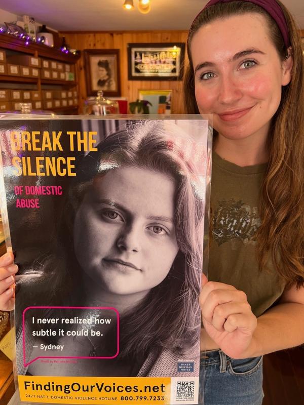 Taylor Fish accepts a poster at Orne’s Candy Store. Patrisha McLean photo