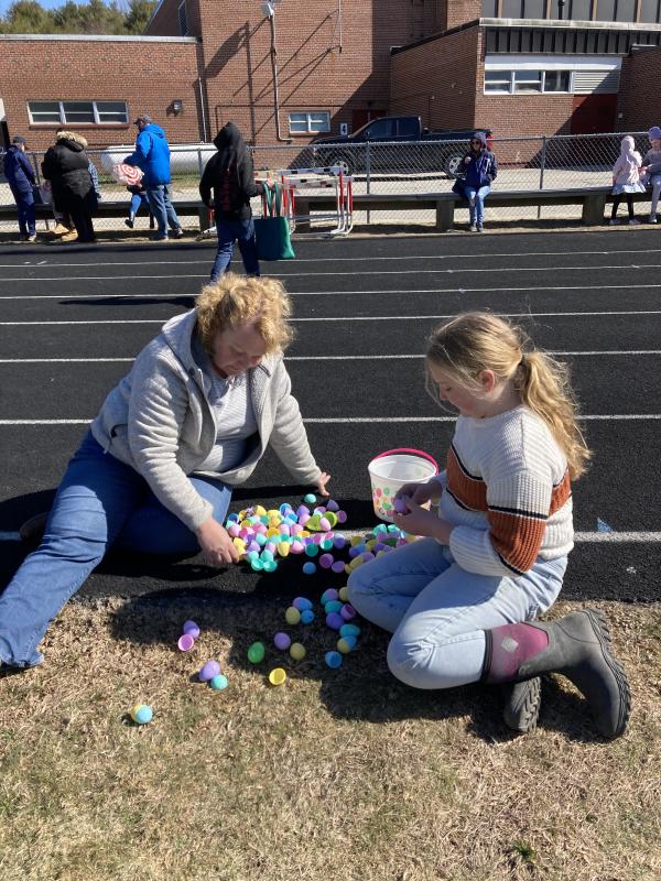 Opening the eggs after the hunt. EDNA MILLER/Wiscasset Newspaper