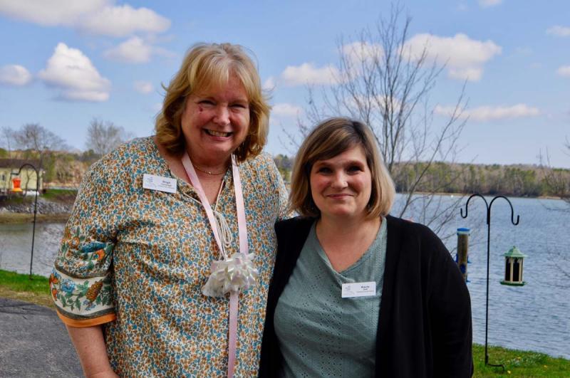 Brigit Cavanagh (left) celebrating her retirement and welcoming Kacie Orff (right) as the new Community Outreach and Experience Director at The Lincoln Home.