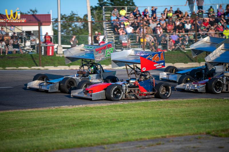 Brad Babb races alongside last year's Bentley Warren Classic winner and fellow Windham native, Bobby Timmons. Courtesy of Steve Girard of SGirardPhotography