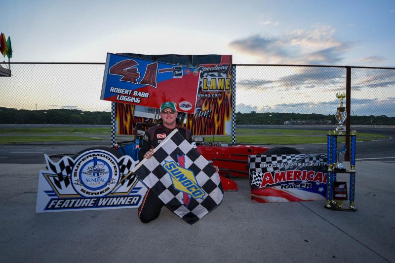Brad Babb celebrates his 350 SMAC Tour win. Courtesy of Steve Girard of SGirardPhotography