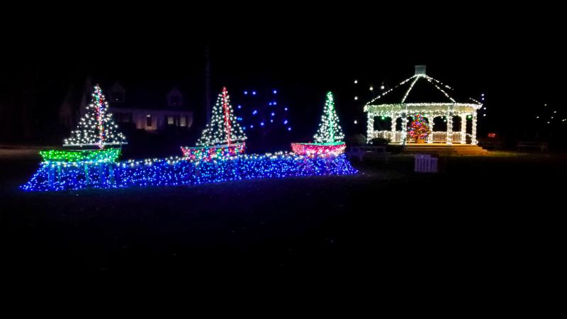 Cell phone shot - Daylight White Balance. Phone held steady with the use of a tripod. Exposure compensated to darken the scene to capture the color of the lights. Michael Leonard photo