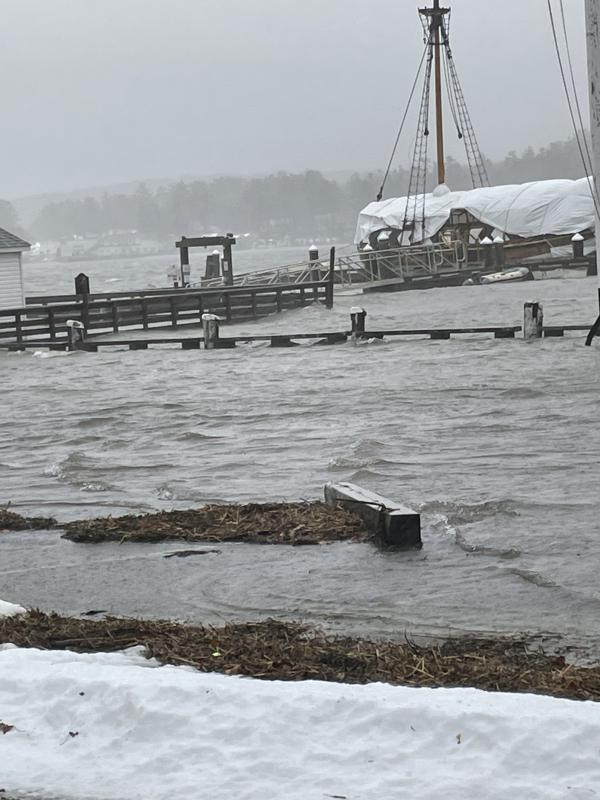 Water runs over a waterfront parking lot. In the distance, the wintering Virginia in the storm. Dennis Simmons photo