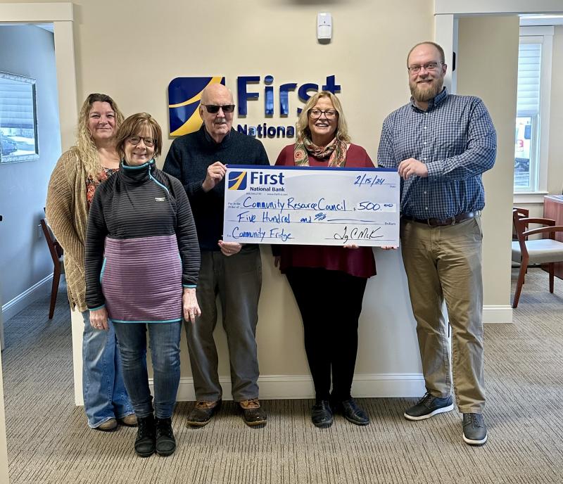 Pictured from left are: First National Bank’s Shannon Wenners and Susan Norton, Community Resource Council’s Peter Gardner and Holly Stover, and First National Bank’s Adam Climo presenting the Community Resource Council with a check for $500 for the Community Fridge in Boothbay Harbor. Courtesy of FNB