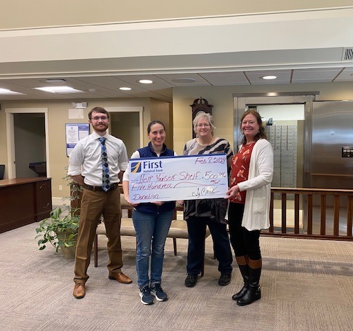 Pictured from left are: First National Bank’s Samuel Jackson, Help Yourself Shelf Food Pantry’s Gabrielle Diperri, and First National Bank’s Jean Moffatt and Monique McRae presenting Help Yourself Shelf with a check for $500. Courtesy of FNB