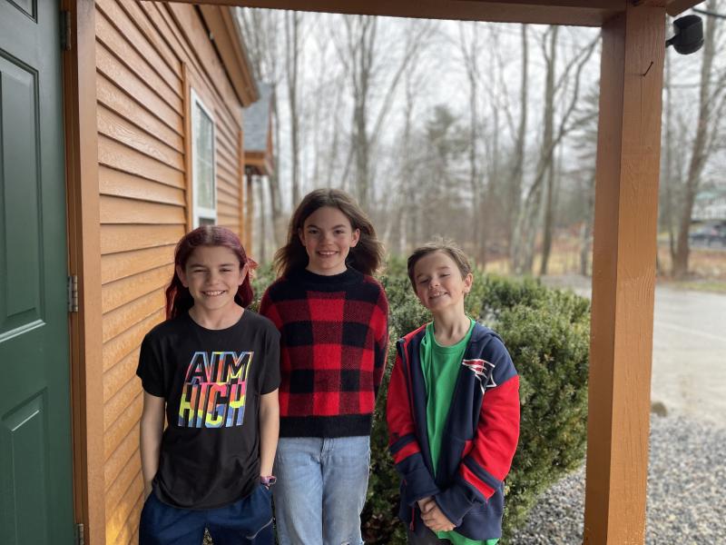 Prize-winning third- and fourth grade poets from the Center for Teaching and Learning include, from left, Violet Gallagher, Flynn Mallory, and Gannon Inman. Courtesy of CTL