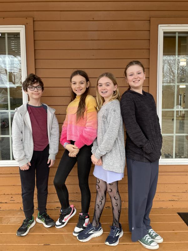 Prize-winning fifth- and sixth-grade poets from the Center for Teaching and Learning include, from left, Charlie Record, Eni Burns, Molly Hynes, and Jackie Branch. Courtesy of CTL