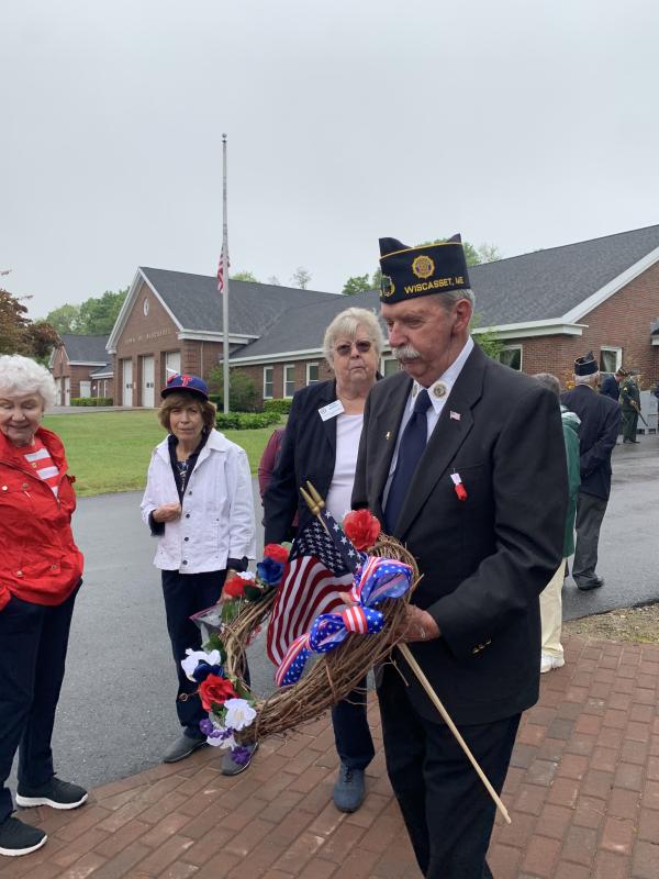 Post 54’s John Kennedy helps prepare the ceremony. SUSAN JOHNS/Wiscasset Newspaper