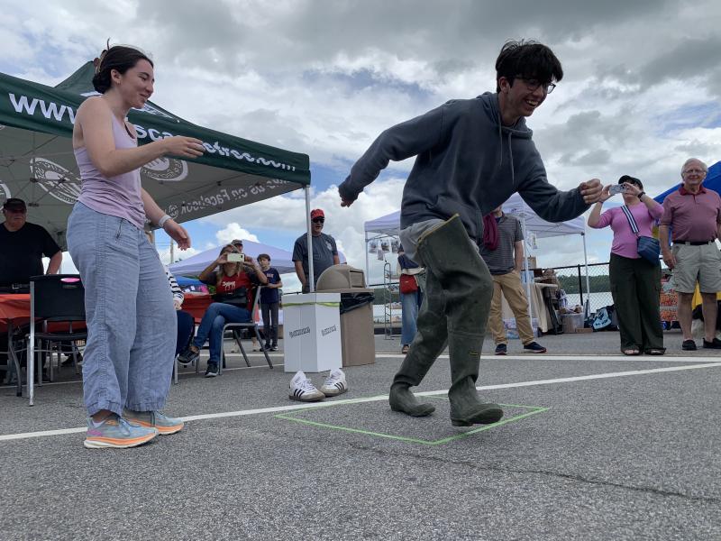 Eleanor Lynch and brother James, both of Alexandria, Virginia, take part in the relay at Wormfest June 8 in Wiscasset. SUSAN JOHNS/Wiscasset Newspaper