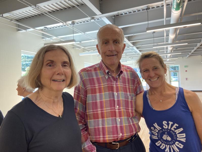 Classmates Susan Lloyd and Paul Tagliabue with instructor Catherine Giles Stecher gather together after the Y’s last “Rock Steady” class of the season. Allyson Goodwin photo
