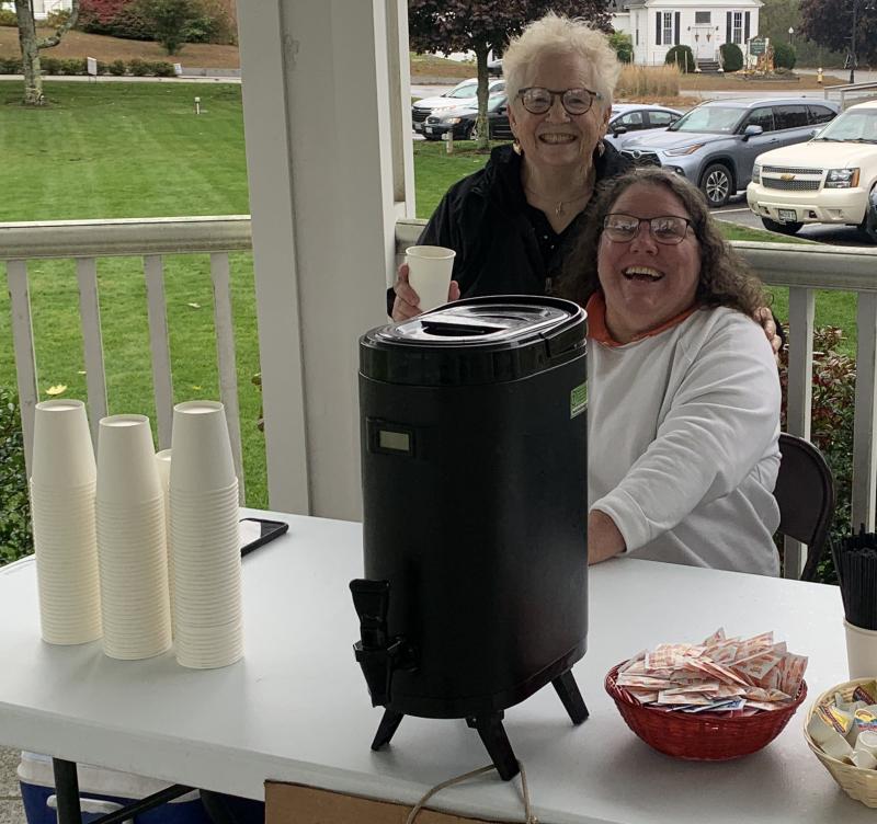Volunteers Nancy Van Dyke, left, and Suzanne Harmon served hot coffee during the yard sale. BILL PEARSON/Boothbay Register Coffee break