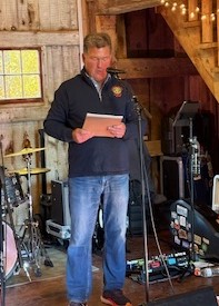 Mike Hall (founder of Karl's Kids) during live auction. Courtesy photo Mike Hall