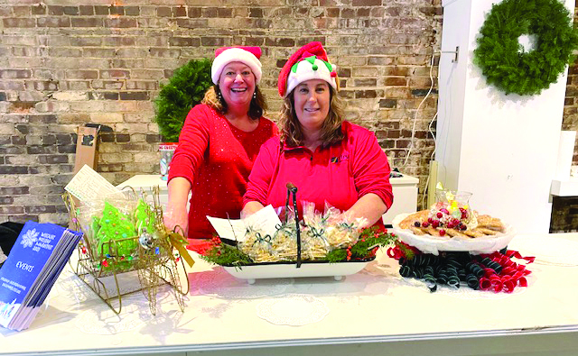 Christmas Cookie Challenge 2023 coordinators Monique McRae, left, and Ann Clifford prepare to welcome home bakers, judges, and cookie fans again in 2024 on Saturday, Dec. 7, at 1:30 p.m. Wiscasset Holiday Marketfest photo Christmas Cookie Challenge