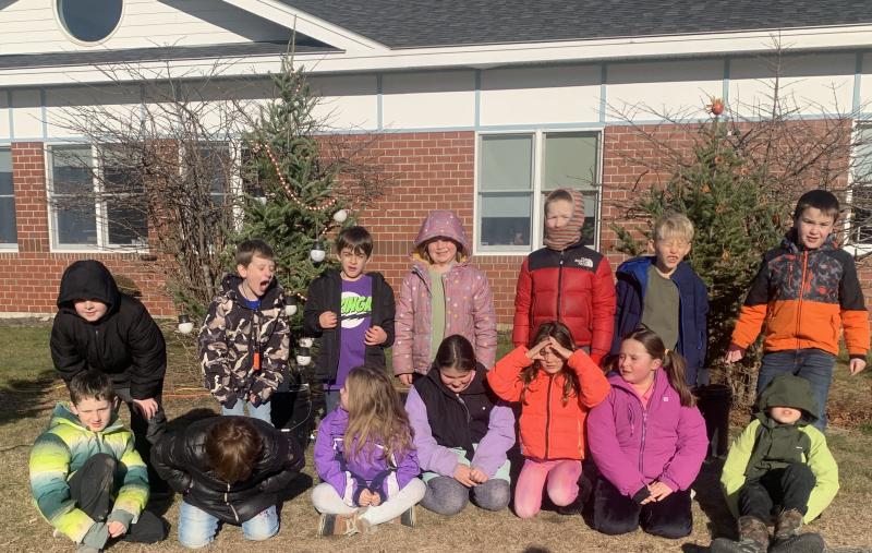 Jennifer Gosselin's second grade class spent time Dec. 13 decorating a tree as part of the annual Edgecomb Charlie Brown Christmas tree decorating contest. BILL PEARSON/Boothbay Register Second grade