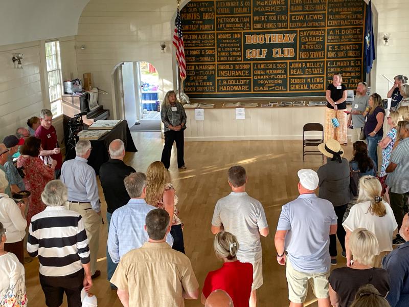 Boothbay Register's Sarah Morley speaks to the Business After Hours crowd at the Boothbay Railway Village Museum Aug. 6. FRITZ FREUDENBERGER/Boothbay Register Boothbay Register's Sarah Morley speaks to the Business After Hours crowd at the Boothbay Railway Village Museum Aug. 6. FRITZ FREUDENBERGER/Boothbay Register