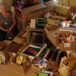 Shown partly surrounded by donated school supplies, Sue Burge is determined to help all students at three area elementary schools start the next school year right. SUSAN JOHNS/Wiscasset Newspaper