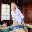 Sonja Weber Gilkey works on her art in her in her Maine studio. 
