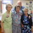 Longtime woolwich grange members receive membership awards. From left, Marion Grover Bailey, Charlotte Waltz Leeman Sutter and Grace Smith receive their awards from Woolwich Grange Master John Hauck, standing in the back. KATHY ONORATO/Wiscasset Newspaper 