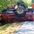 Emergency personnel begin working to get the driver out of the overturned truck. KATHY ONORATO/Wiscasset Newspaper