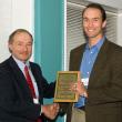 University of Maine School of Law professor Jeffrey Thaler presents the E2 Can Do! award to Chewonki’s president Willard Morgan at a dinner in Portland. Courtesy of Chewonki 
