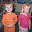 J.J. and Grace find a new place to display their library stickers. Rumor has it that it was J.J.’s idea. Courtesy of Wiscasset Public Library 