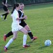Freshman Kennedy Orr out runs a Lisbon defender to the ball. KATHY ONORATO/Wiscasset Newspaper   