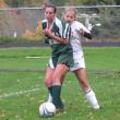 Sam Arsenault defends against a Winthrop player. 