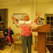 National breast cancer awareness representative Debbie Jones holds up one of many bras that will be hung in the town office meeting room. CHARLOTTE BOYNTON/Wiscasset Newspaper