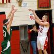 Austin Haskell launches a shot up over a Carrabec defender.