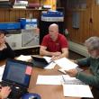 Edgecomb Selectmen Jessica Chubbuck, left, Stuart Smith and Jack Sarmanian discuss Chubbuck's proposal for 1 percent pay hikes. SUSAN JOHNS/Wiscasset Newspaper