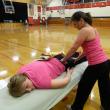 Tracey Verney enjoys a pre-workout massage from trainer Kristina Phillips during Week 2 of Lisa Hall’s Weight Loss Challenge. KATHY ONORATO/Wiscasset Newspaper