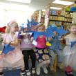Story Time children display their own Pete and his shoes. The cats held still for a picture except for Henry’s who jumped in front of his face as the picture was being taken. Courtesy of Wiscasset Public Library