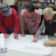 Woolwich Selectmen look over preliminary sketches of a proposed town office addition to be approved by voters at the annual town meeting May 8. From left are Lloyd Coombs, Jason Shaw and Allison Hepler. JOHN MAGUIRE/Wiscasset Newspaper