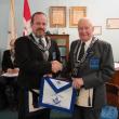 Curtis W. West, right, receives his Life Member apron from Worshipful Mike Leighton. Courtesy of Gary Tilton