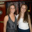 Student Council members Briana Goud and Sarah Hanley welcome students from four other high schools to the dance on April 26. Courtesy of Wiscasset High School