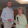 Wiscasset senior Brandon Williams accepts the Wiscasset Senior Center Scholarship from selection committee member, Arlene Polewarczyk. Courtesy of Wiscasset Senior Center