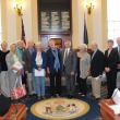 Family and friends of the late Bruce Stedman gather at the State House in Augusta to hear Sen. Chris Johnson present a Legislature Sentiment remembering his public service. Courtesy of Mary Ellen Barnes
