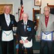 Eugene Kelley, center, is presented his 50 Year Service medal by Arnold Thibodeau, left, and John Arsenault at a recent meeting at Seaside Lodge of Masons. Courtesy of Gary Tilton