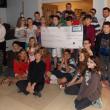Project Reach students select the Feed Our Scholars program to receive the $1,000 donation from the Unity Foundation. Courtesy of Wiscasset Middle School