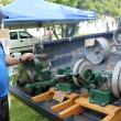 Elwin Plummer of Casco restored these antique washing machine engines. SUE MELLO/Boothbay Register