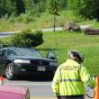 A Cadillac sedan was rear-ended by a Chevrolet Silverado on Route 1 in Edgecomb on July 5. Edgecomb Fire Chief Roy Potter directs traffic. RYAN LEIGHTON/Boothbay Register
