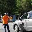 “Wings” volunteer Bryan Buck helps direct traffic near the Wiscasset Municipal Airport the morning of the event. Volunteers played a vital role in “Wings,” and next year, organizers hope to secure them sooner. SUSAN JOHNS/Wiscasset Newspaper