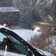 car and bus on Head Tide Hill in Alna