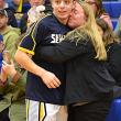 Seahawk senior Dominick Dow gets a kiss from his mother, Emily Dow, during Senior Night. KEVIN BURNHAM/Boothbay Register